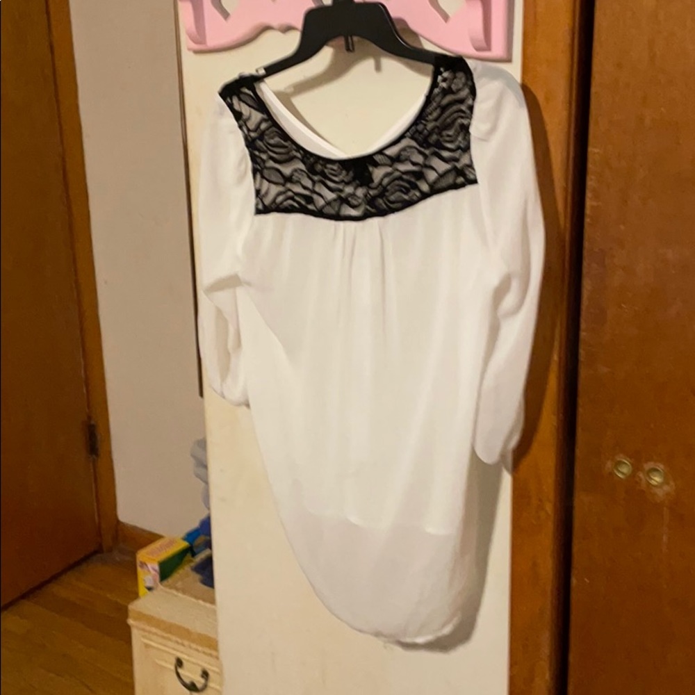 White blouse with black lace on top